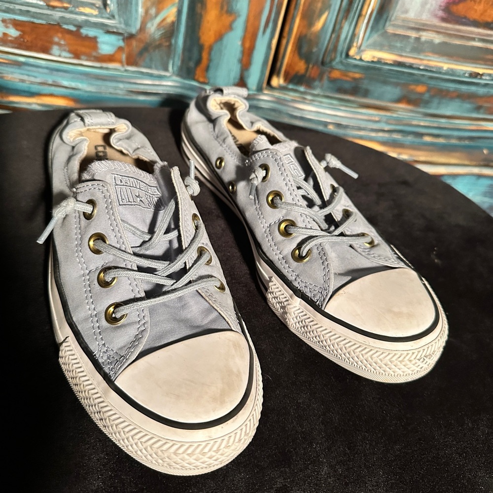 Baby blue converse, gently worn. Size 8